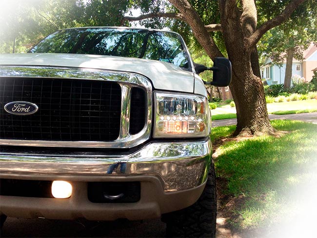 2002 ford excursion headlight removal
