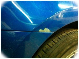 How to Cover Chipped Paint on a Car 
